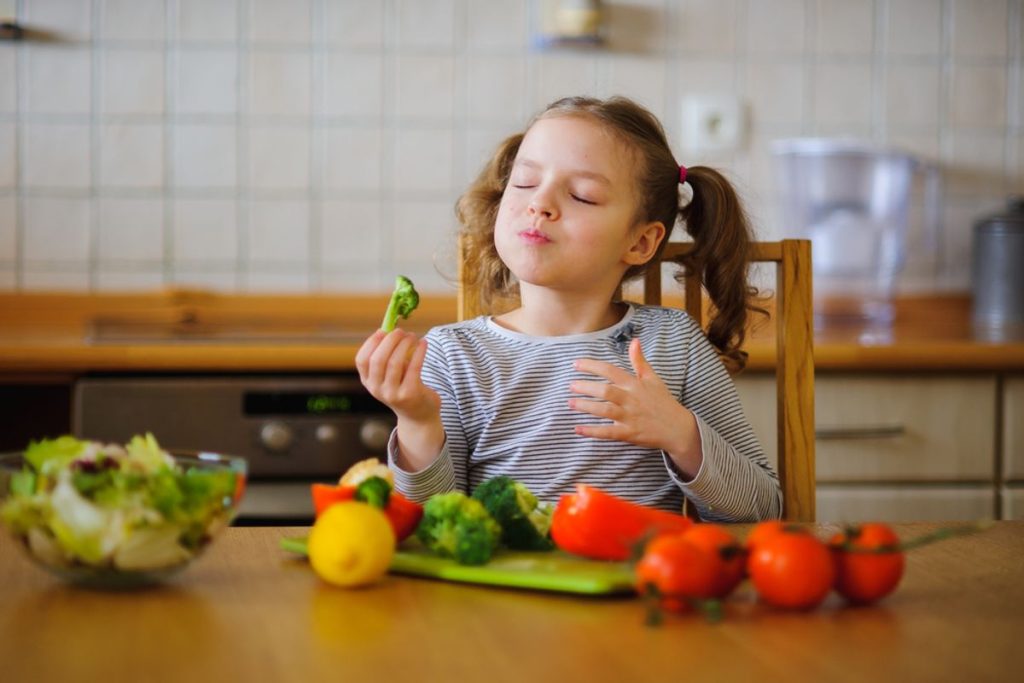 girl-eating-veggies-x.jpg